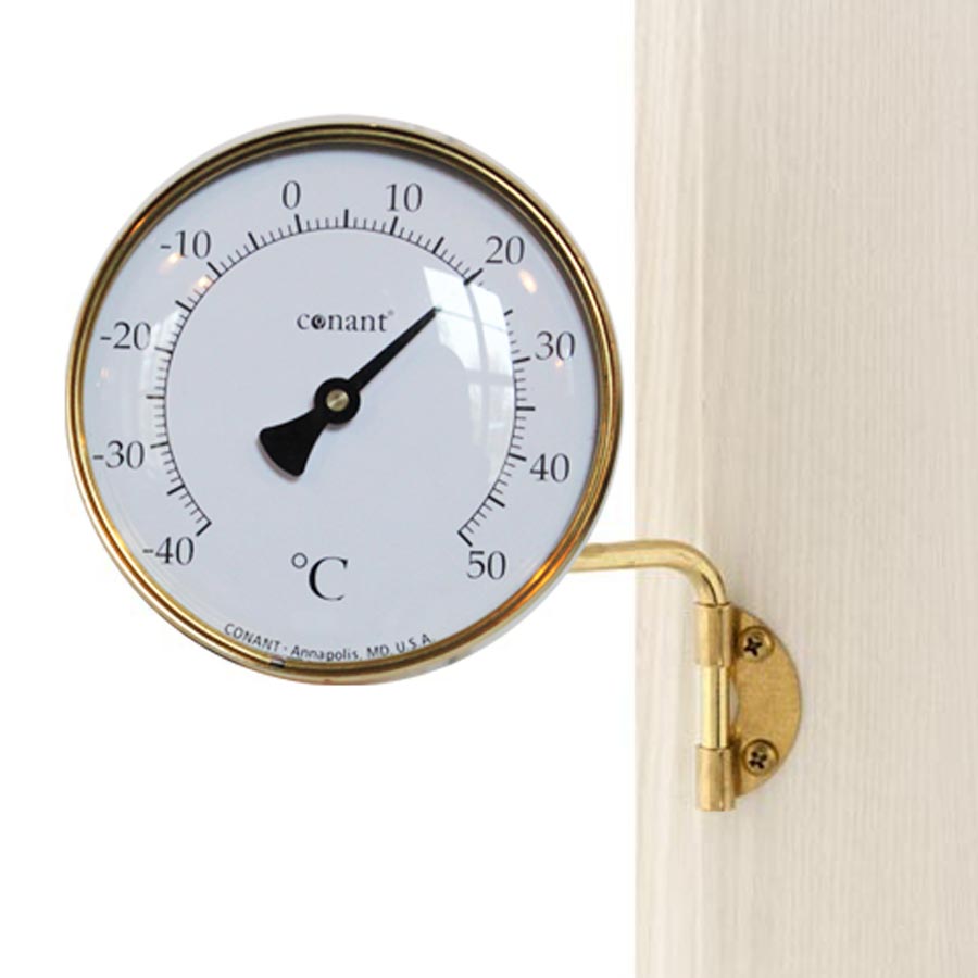 Rundt termometer i messing