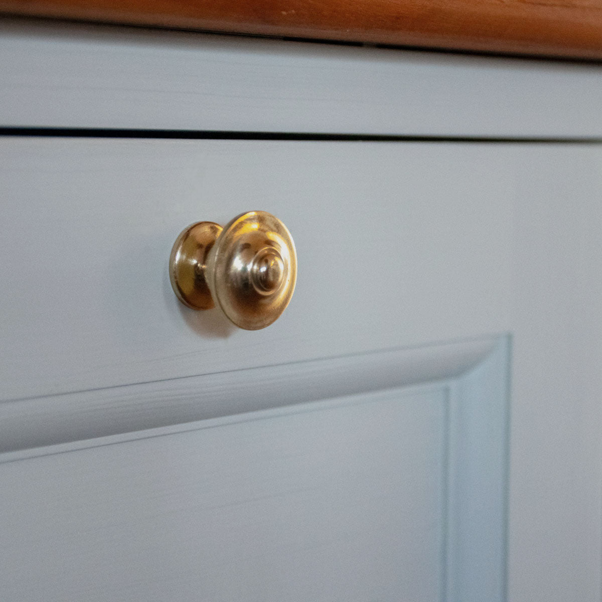 Lille knop i messing Slogstorp