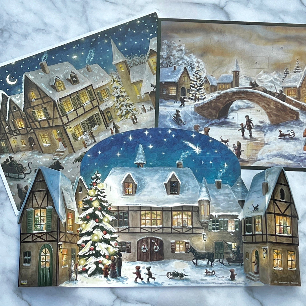 Adventskalender 3D Schneebedeckte Stadt mit Fachwerkhäusern