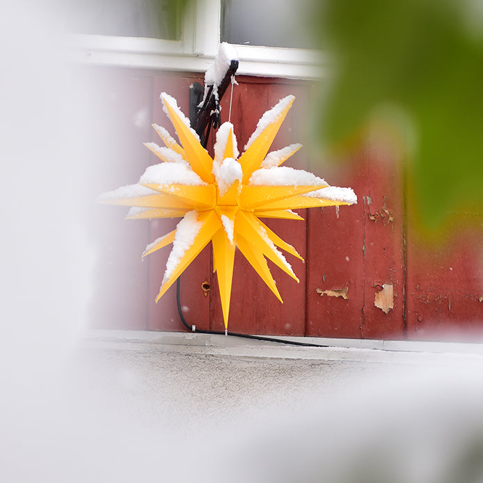 adventsstjärna herrnhuter utomhus gul image