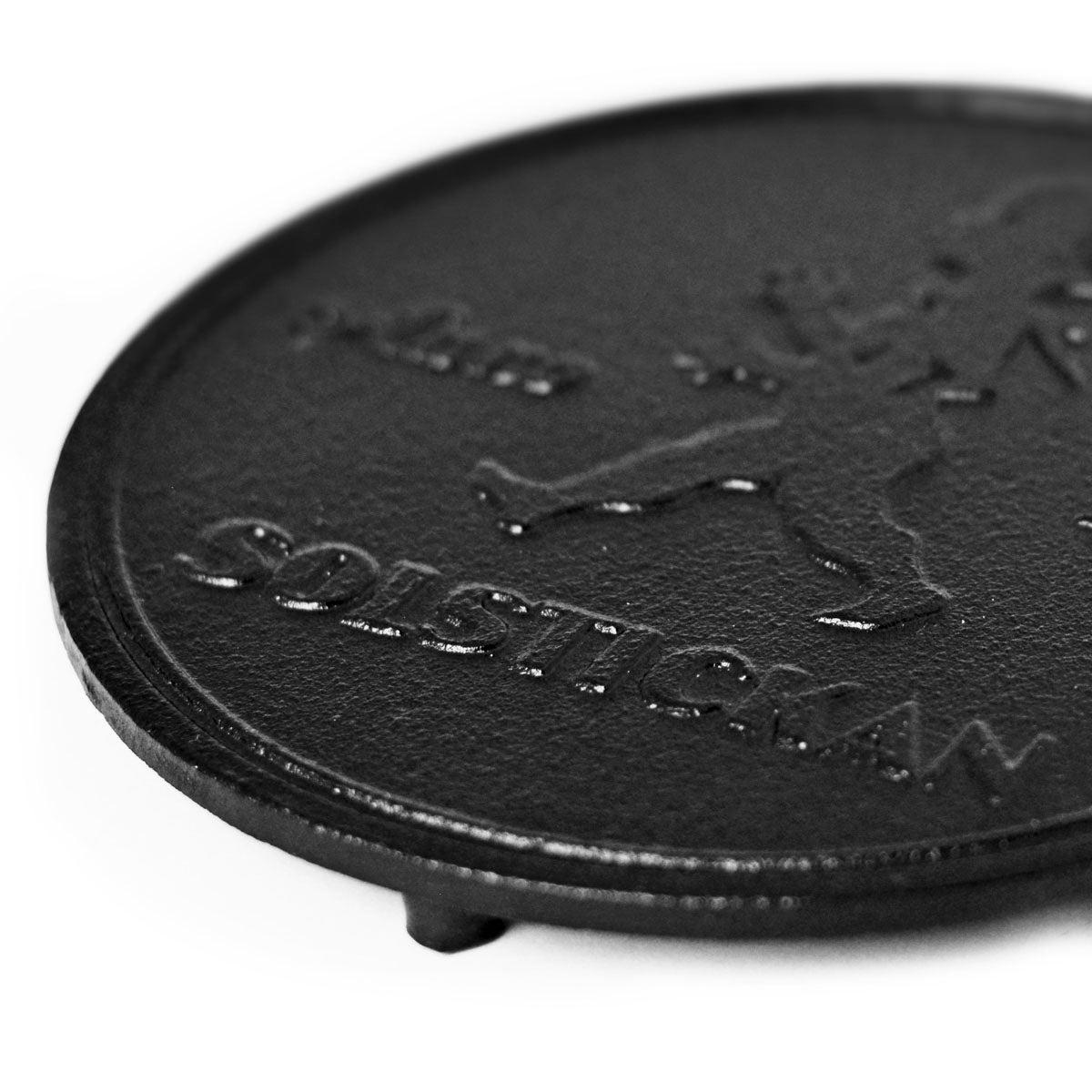 Solstickan grydeunderlag i støbejern sort