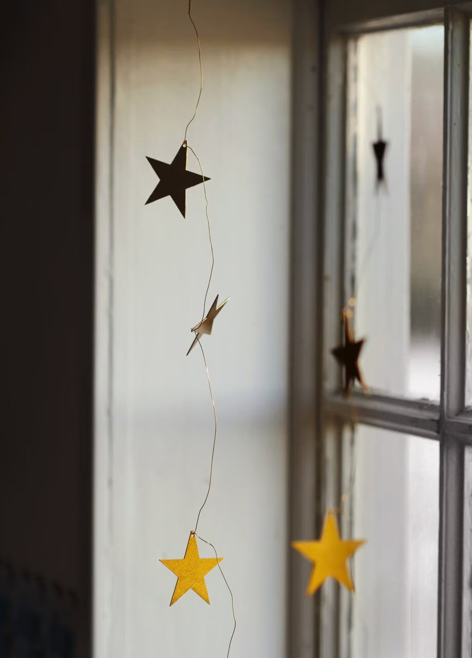 Girlande Sterne Messing