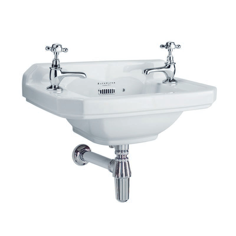 tvättställ i porslin med två blandarhål