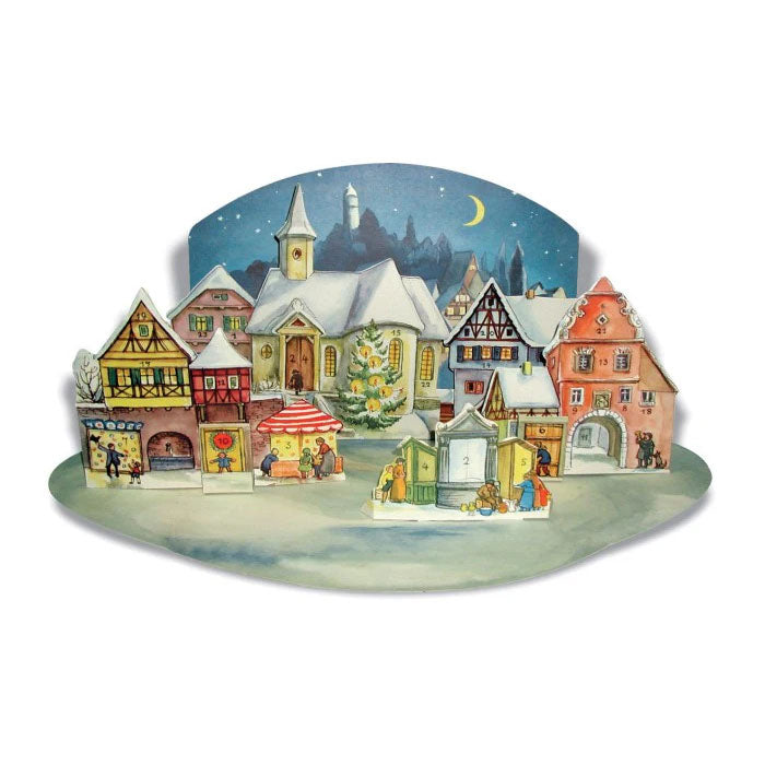 Adventskalender 3D snötäckt stad med korsvirkeshus